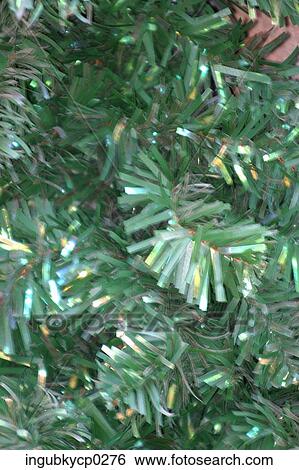 Close-up of an artificial Christmas tree View Large Photo Image Stock Photograph - Close-up of an artificial Christmas tree. Fotosearch