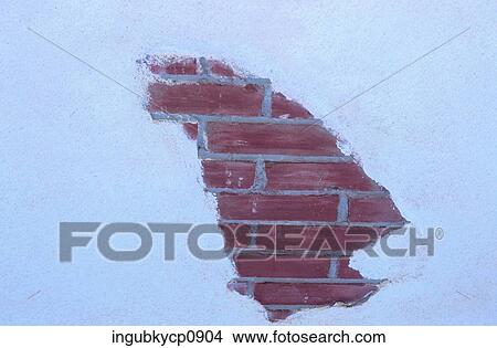 Picture - Close-up of an exposed patch of brick wall. Fotosearch
