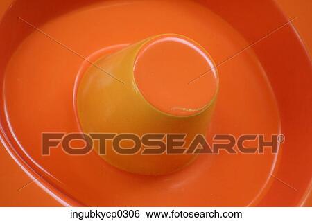 Close-up of an orange colored vessel View Large Photo Image Stock Photograph - Close-up of an orange colored vessel. Fotosearch