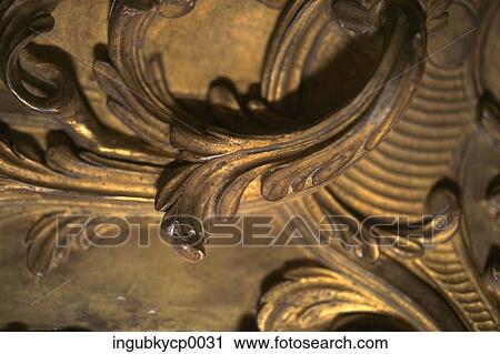 Close-up of an ornate sculpture on a wall View Large Photo Image Stock Image - Close-up of an ornate sculpture on a wall. Fotosearch