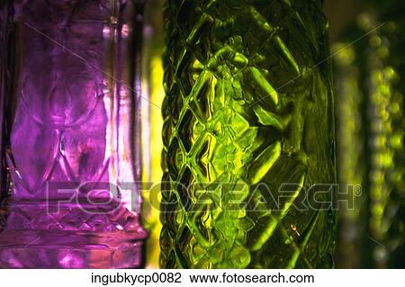 Close-up of glass bottles View Large Photo Image Stock Image - Close-up of glass bottles. Fotosearch