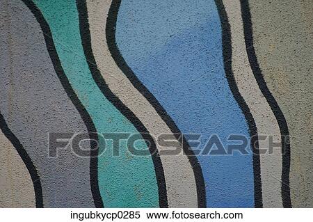 Stock Photography - Close-up of graffiti on a stucco wall. Fotosearch