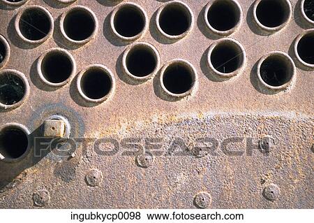 Close-up of rivets and holes on a metal surface View Large Photo Image Stock Photo - Close-up of rivets and holes on a metal surface. Fotosearch