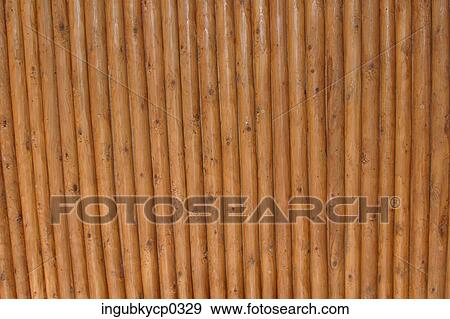 Stock Photo - Close-up of the surface of a bamboo fence. Fotosearch