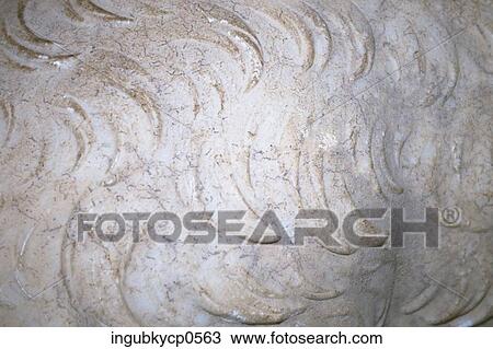 Stock Image - Close-up of the surface of a concrete wall. Fotosearch