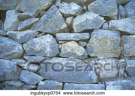Picture - Close-up of the surface of a stone wall. Fotosearch