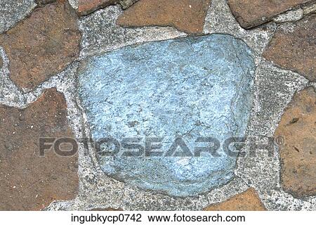 Close-up of the surface of a stone wall View Large Photo Image Stock Image - Close-up of the surface of a stone wall. Fotosearch