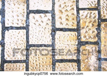 Stock Photograph - Close-up of the surface of a tiled wall. Fotosearch