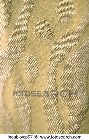 Close-up of the surface of an embossed fabric View Large Photo Image Stock Photograph - Close-up of the surface of an embossed fabric. Fotosearch