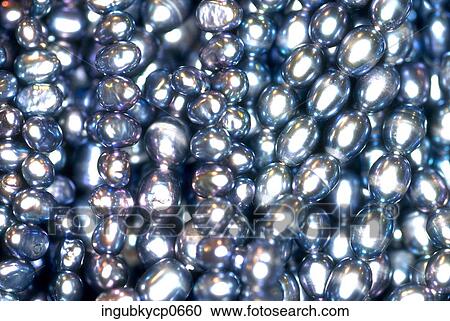 Close-up of the surface of beads View Large Photo Image Stock Image - Close-up of the surface of beads. Fotosearch