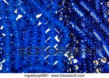 Close-up of the surface of beads View Large Photo Image Stock Image - Close-up of the surface of beads. Fotosearch