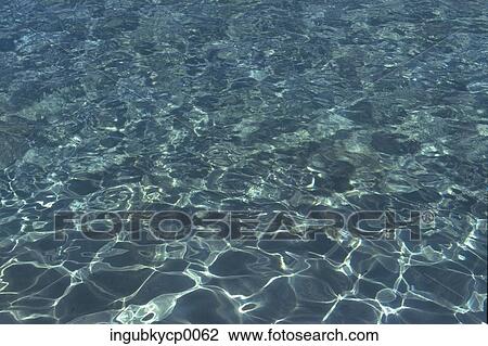 Close-up of the surface of water View Large Photo Image Stock Image - Close-up of the surface of water. Fotosearch