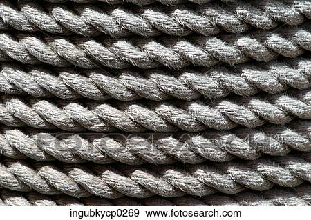 Close-up of thick coiled rope View Large Photo Image Stock Photo - Close-up of thick coiled rope. Fotosearch