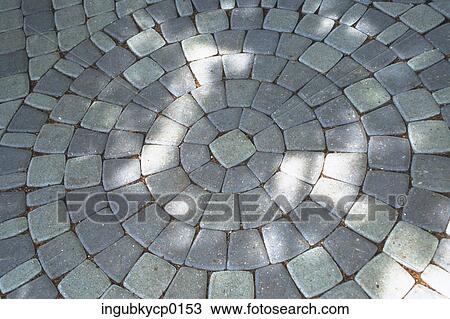 Stock Image - High angle view of a mosaic stone path. Fotosearch