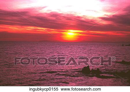 Stock Photography - High angle view of the sea at dusk. Fotosearch