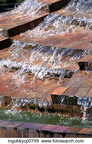High angle view of water flowing down a tiled surface View Large Photo Image Stock Photo - High angle view of water flowing down a tiled surface. Fotosearch