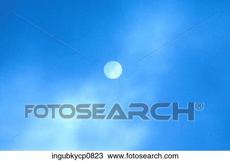 Low angle view of the moon in the sky View Large Photo Image Stock Image - Low angle view of the moon in the sky. Fotosearch