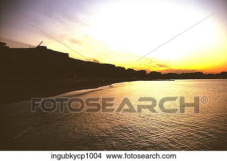 Panoramic view of the sea at dusk View Large Photo Image Picture - Panoramic view of the sea at dusk. Fotosearch