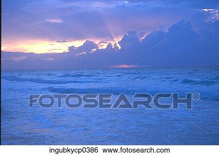 Panoramic view of the sea at dusk View Large Photo Image Stock Photograph - Panoramic view of the sea at dusk. Fotosearch