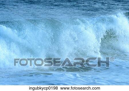 Waves breaking in the sea View Large Photo Image Stock Photo - Waves breaking in the sea. Fotosearch