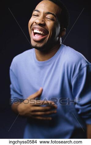 Picture - black, African, mouth open, laugh. Fotosearch