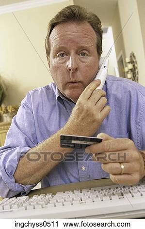 Brown, cordless, consumerism, hold, credit card, retail View Large Photo Image Stock Image - Brown, cordless, consumerism, hold, credit card, retail. Fotosearch