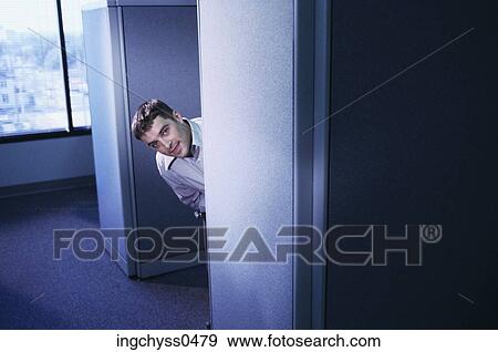 Stock Photo - Brown, curiosity, peek, Young Adult, surveillance, Looking at Camera. Fotosearch