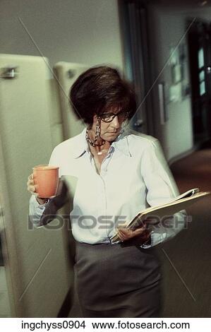 Brown, woman, beverage, indoors, cloth View Large Photo Image Picture - Brown, woman, beverage, indoors, cloth. Fotosearch