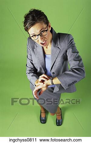 Stock Image - Brown, woman, high, mouth open, Caucasian, look. Fotosearch