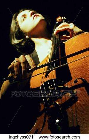 Brown, woman, long hair, Caucasian, years, musical instrument, angle View Large Photo Image Stock Image - Brown, woman, long hair, Caucasian, years, musical instrument, angle. Fotosearch