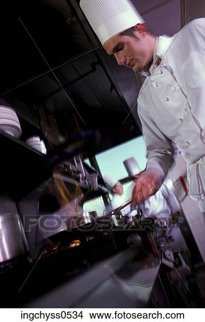 Picture - cooking, hospitality, restaurant, professional, personnel, brunette. Fotosearch