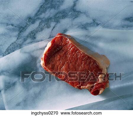 Stock Image - eating, eye, Food and Drink, Rib Eye Steak, healthy, raw, still. Fotosearch