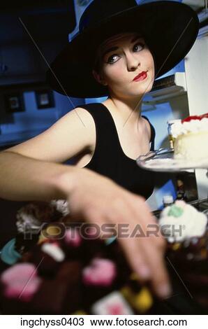 Stock Image - eating, woman, drink, dessert, pastry. Fotosearch