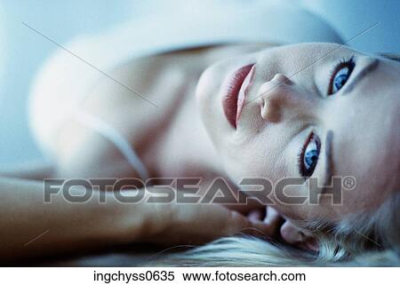 Stock Photography - eye, relaxation, indoors, cloth, desire. Fotosearch