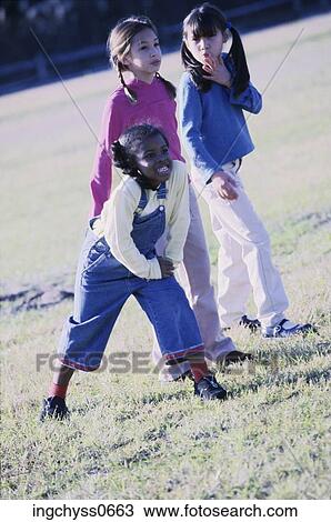 Field, group, girls, clothing, portrait, happiness, casual View Large Photo Image Stock Image - Field, group, girls, clothing, portrait, happiness, casual. Fotosearch