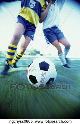 Stock Photography - Field, people, kicking, player, cloth, move. Fotosearch