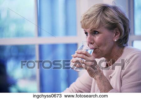 glass, water, shoulders, indoors, cloth, domestic View Large Photo Image Stock Image - glass, water, shoulders, indoors, cloth, domestic. Fotosearch