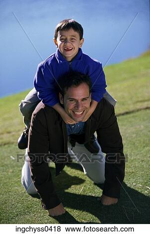 grass, men, father, fun, clothing, crawling, portrait View Large Photo Image Stock Photo - grass, men, father, fun, clothing, crawling, portrait. Fotosearch