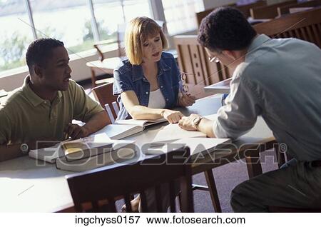 Stock Photo - group, men, education, student, learning, college, looking down. Fotosearch