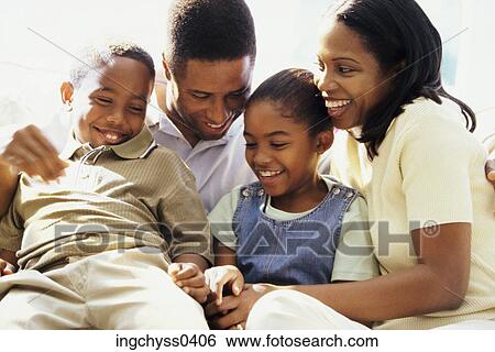 group, men, girls, looking down, daughter, clothing, happiness View Large Photo Image Stock Photograph - group, men, girls, looking down, daughter, clothing, happiness. Fotosearch