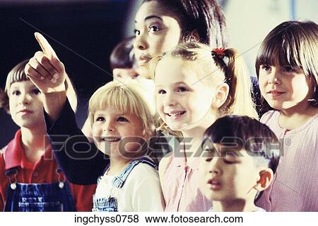 group, women, boys, girls, clothing, happiness, innocence View Large Photo Image Stock Photo - group, women, boys, girls, clothing, happiness, innocence. Fotosearch
