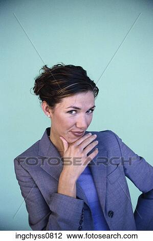 hand, Brown, Looking at Camera, brown hair, Hand on Chin, Waist Up View Large Photo Image Stock Image - hand, Brown, Looking at Camera, brown hair, Hand on Chin, Waist Up. Fotosearch