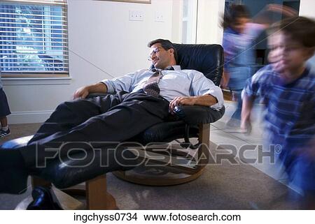 men, people, children, pants, reclining, tired View Large Photo Image Picture - men, people, children, pants, reclining, tired. Fotosearch