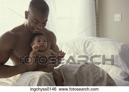 men, people, infant, togetherness, front, hold, indoors View Large Photo Image Stock Photograph - men, people, infant, togetherness, front, hold, indoors. Fotosearch