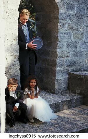Stock Photography - men, people, three, young, outdoors, architecture, view. Fotosearch