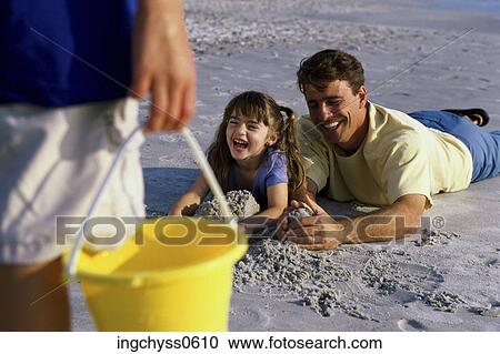 men, sand, family, child, children, long View Large Photo Image Stock Image - men, sand, family, child, children, long. Fotosearch