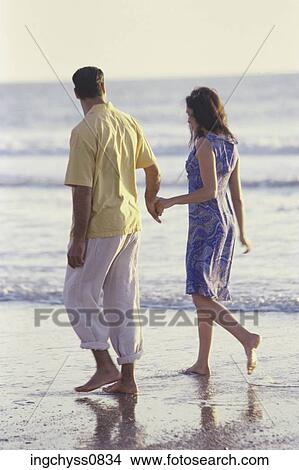 men, sand, full, clothing, leisure, carefree, wave View Large Photo Image Picture - men, sand, full, clothing, leisure, carefree, wave. Fotosearch