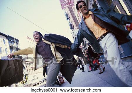 men, women, bag, jacket, tilt, pants, sidewalk View Large Photo Image Stock Image - men, women, bag, jacket, tilt, pants, sidewalk. Fotosearch