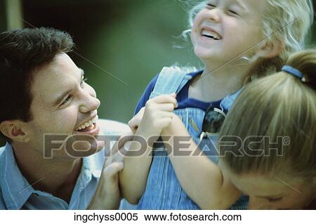 men, women, overalls, father, fun, girls, daughter View Large Photo Image Stock Photography - men, women, overalls, father, fun, girls, daughter. Fotosearch