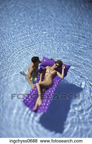 men, women, play, sunbathing, full, looking down, leisure View Large Photo Image Stock Photo - men, women, play, sunbathing, full, looking down, leisure. Fotosearch